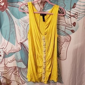 Gorgeous yellow top with pearl accent